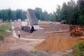 Installation of sidewalks and road base for manufactured houseing community - Bay City